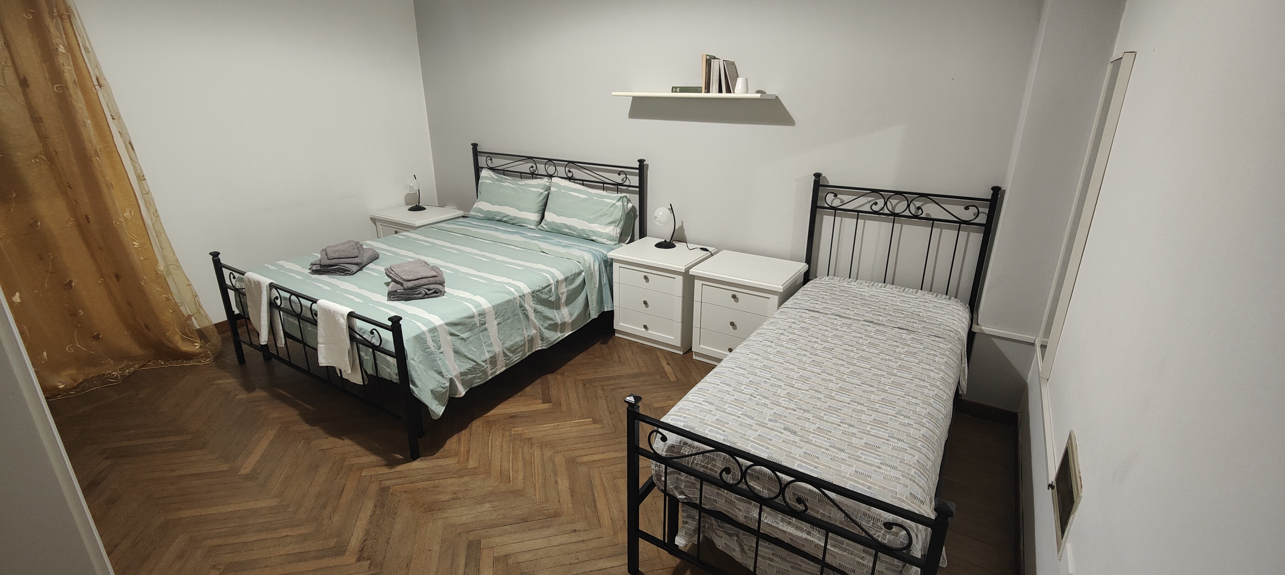 Camera tripla con bagno condiviso