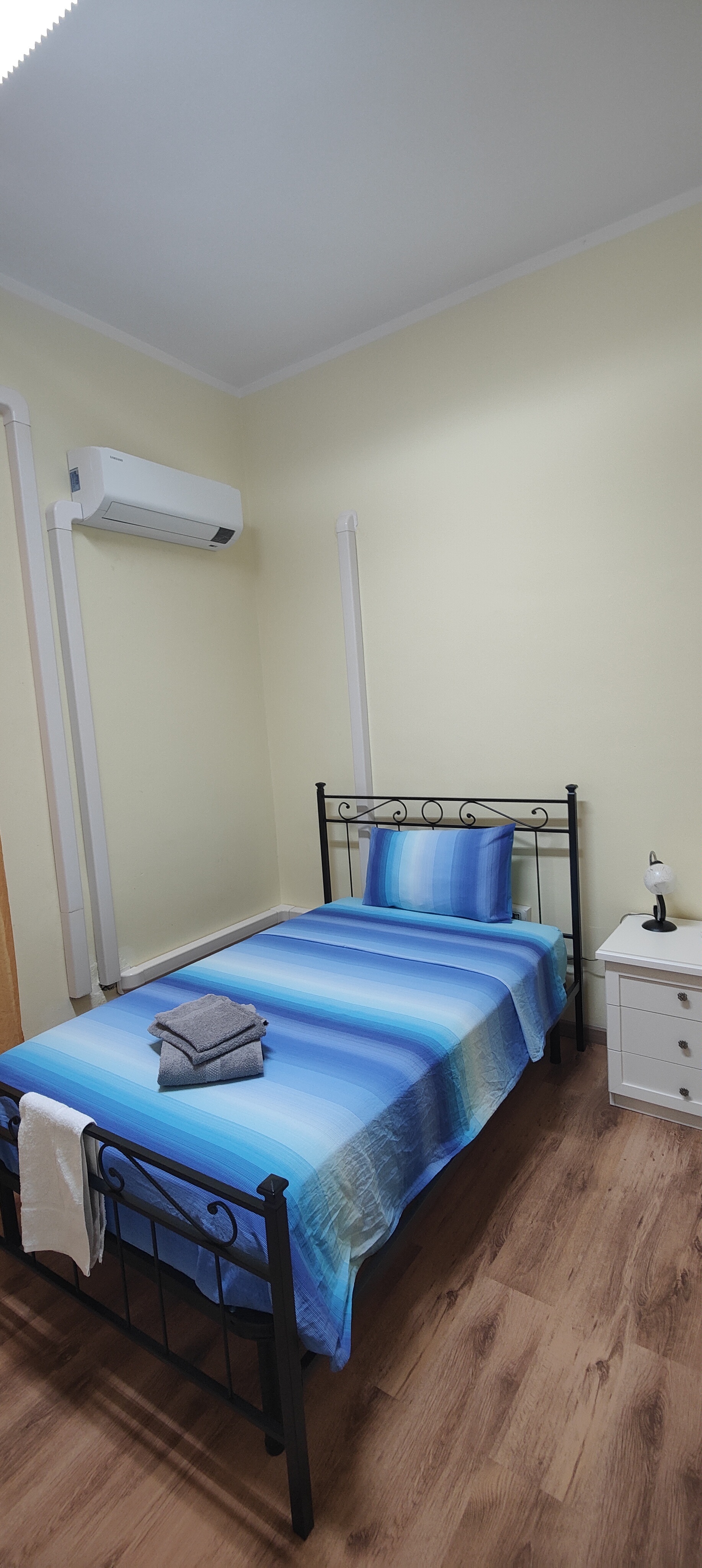 Camera singola con bagno condiviso